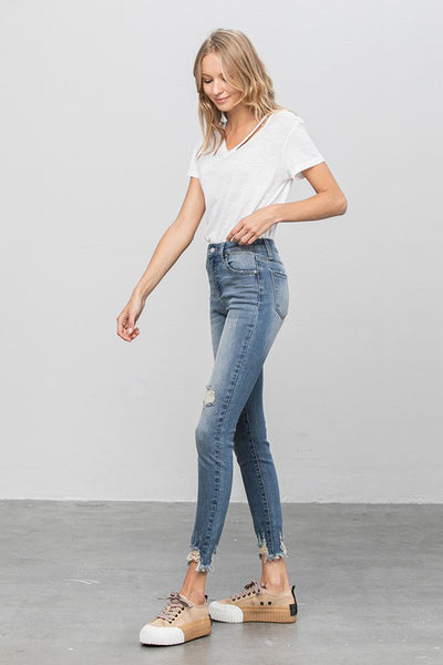 HIGH STRETCH MID RISE SKINNY JEANS